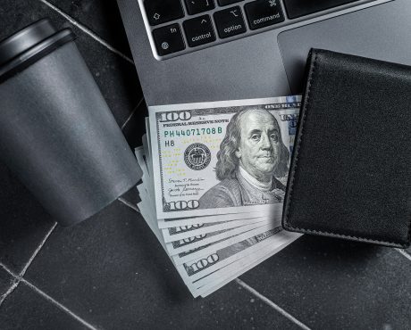 Corporate business desktop with laptop, digital tablet, wallet,