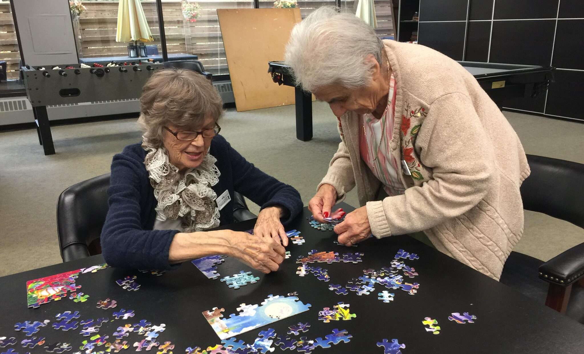 Members solving puzzle